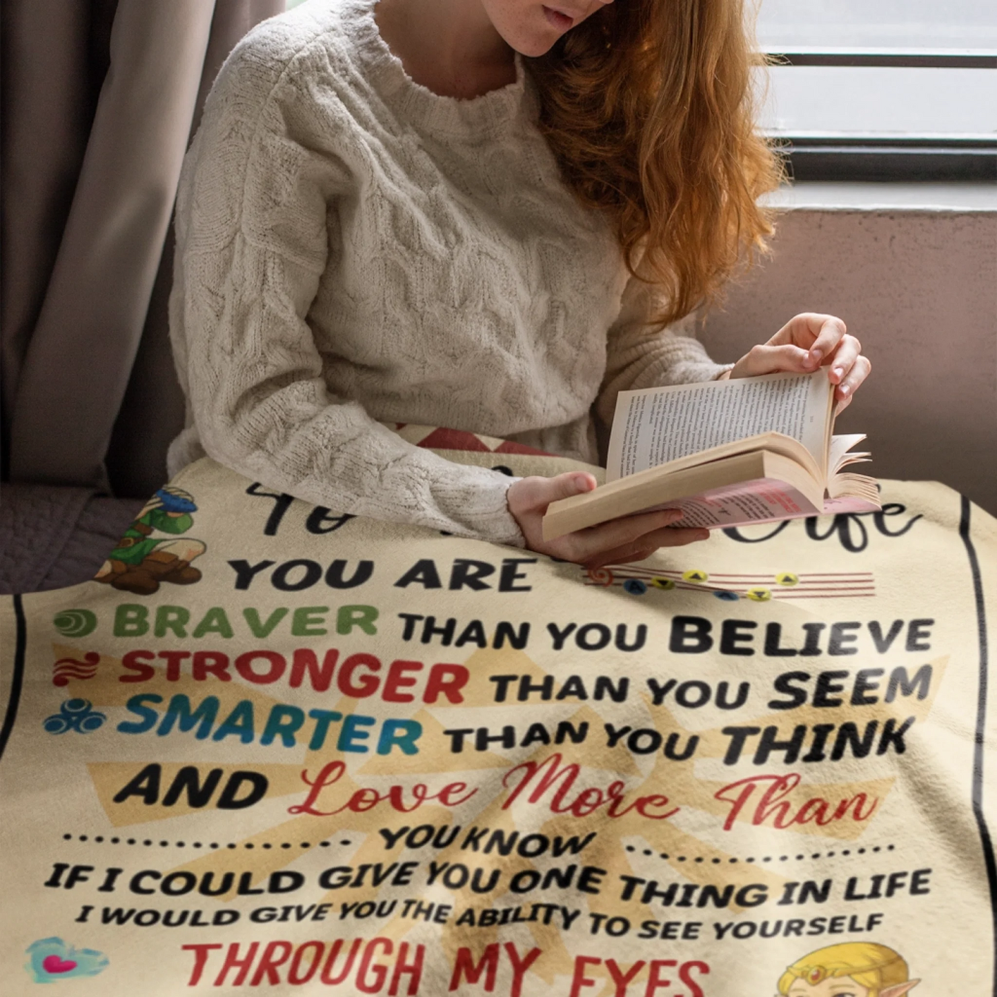 fleece-blanket-mockup-featuring-a-cozy-woman-reading-a-book-24682